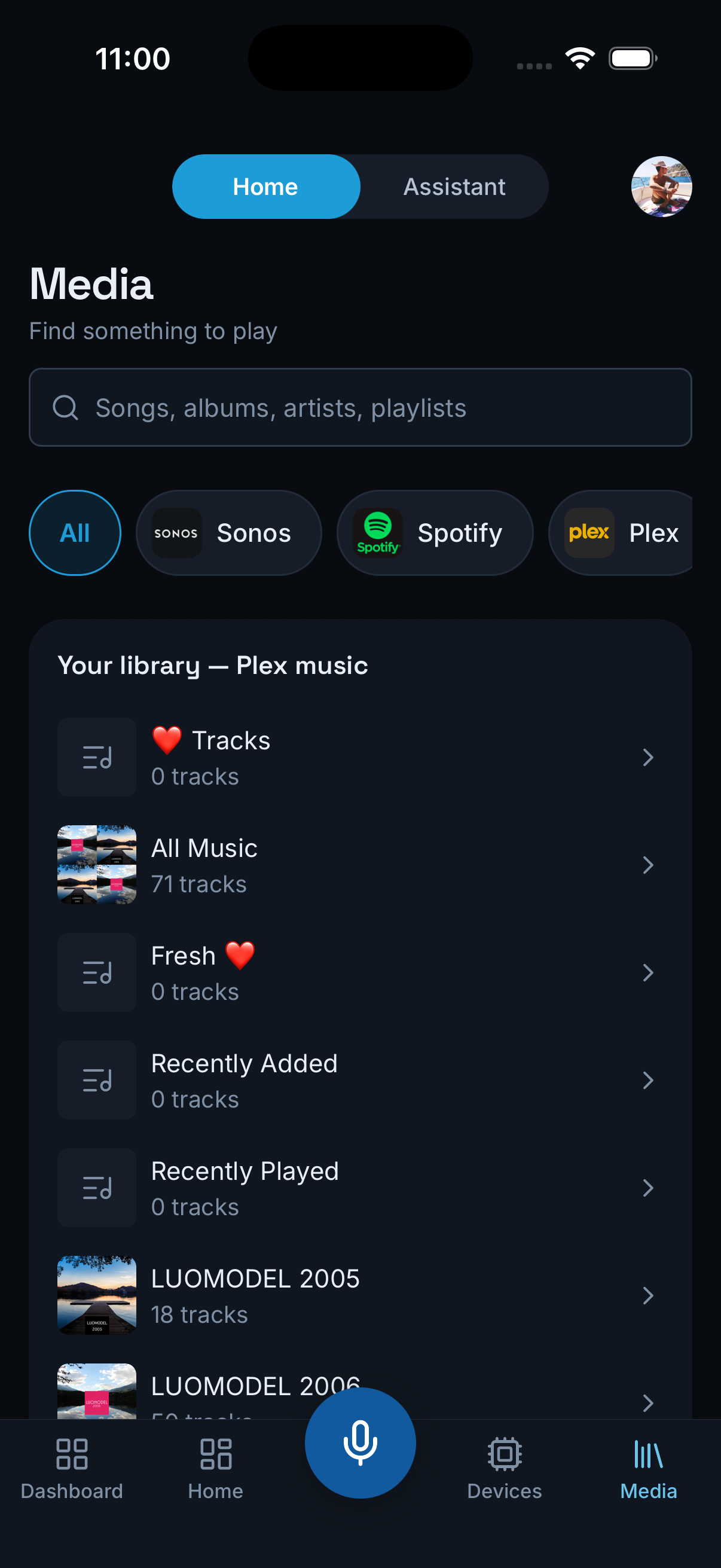 Actual dark ALYT Media library with Sonos, Spotify and Plex sources and music collections.